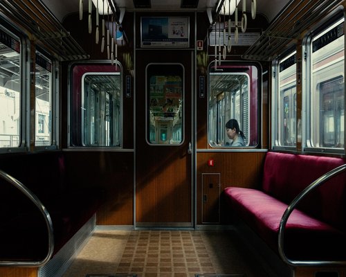 Woman performing gentle morning stretching routine in a calm living room setting